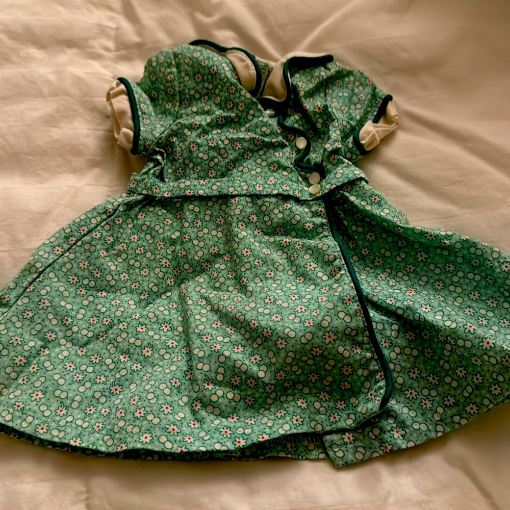 Retired bundle of American girl outfits in mint condition.